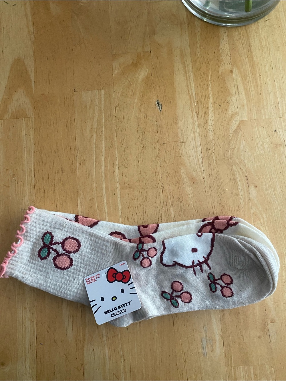 Hello Kitty 2 pair mid crew Socks Beige with Pink Cherries Other has bows. NWT